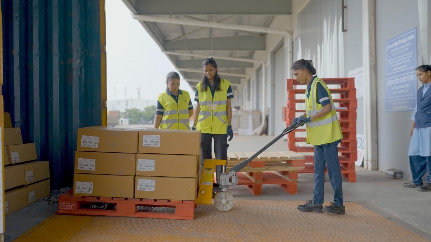 Logistics team loading a shipment